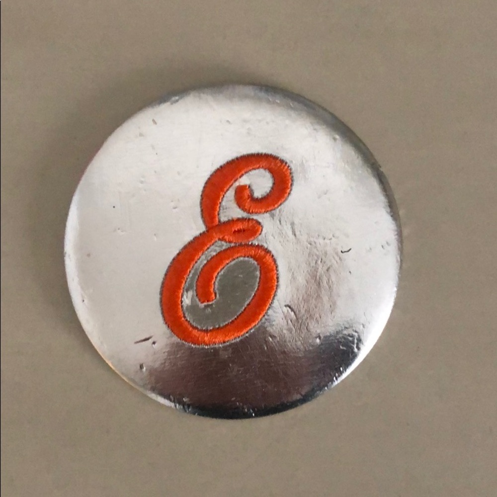 Purse mirror - orange letter “E”
